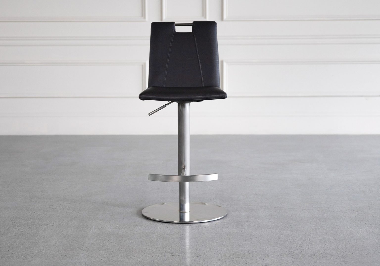 adele black vinyl swivel bar stool front
