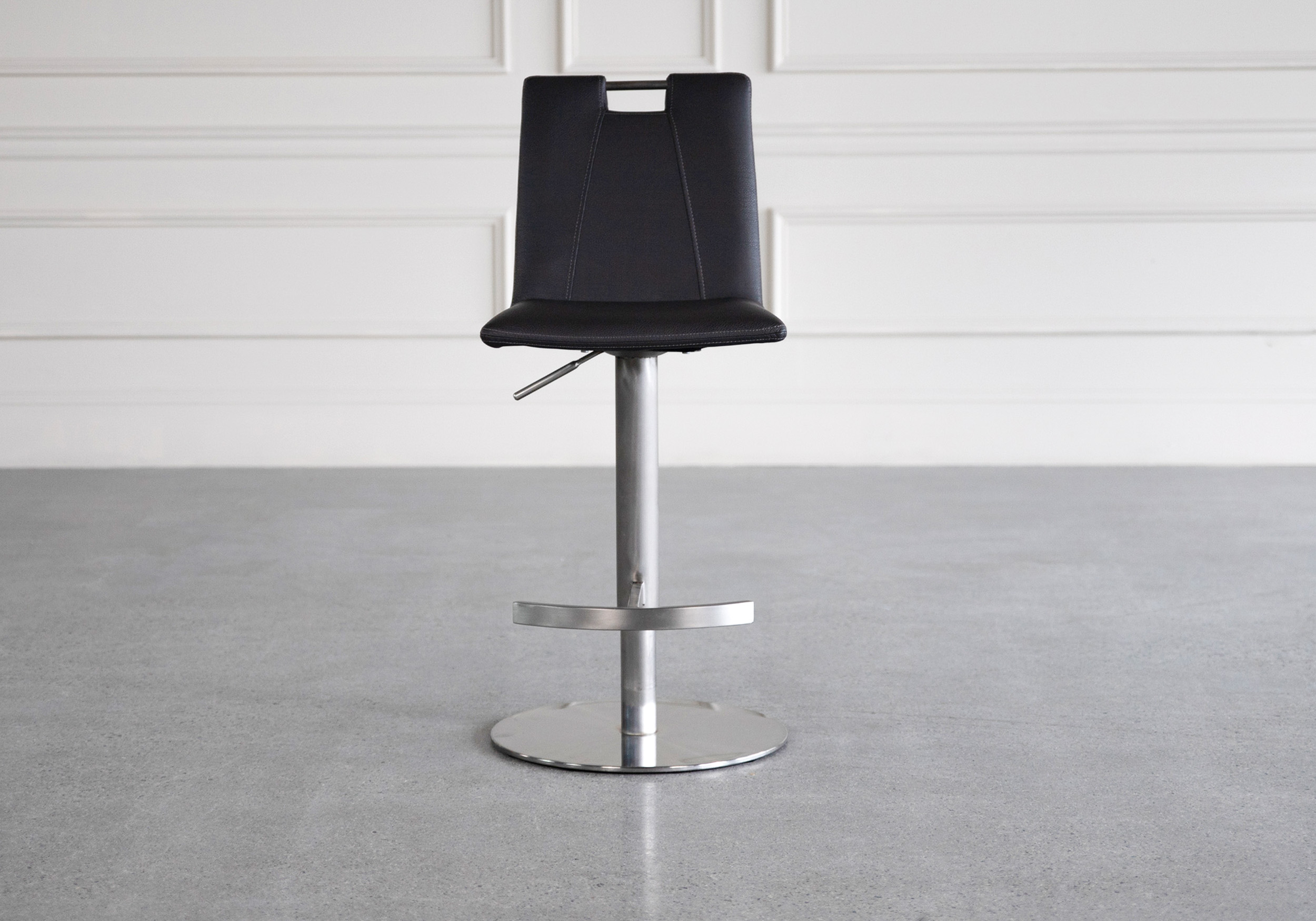 adele black vinyl swivel bar stool front