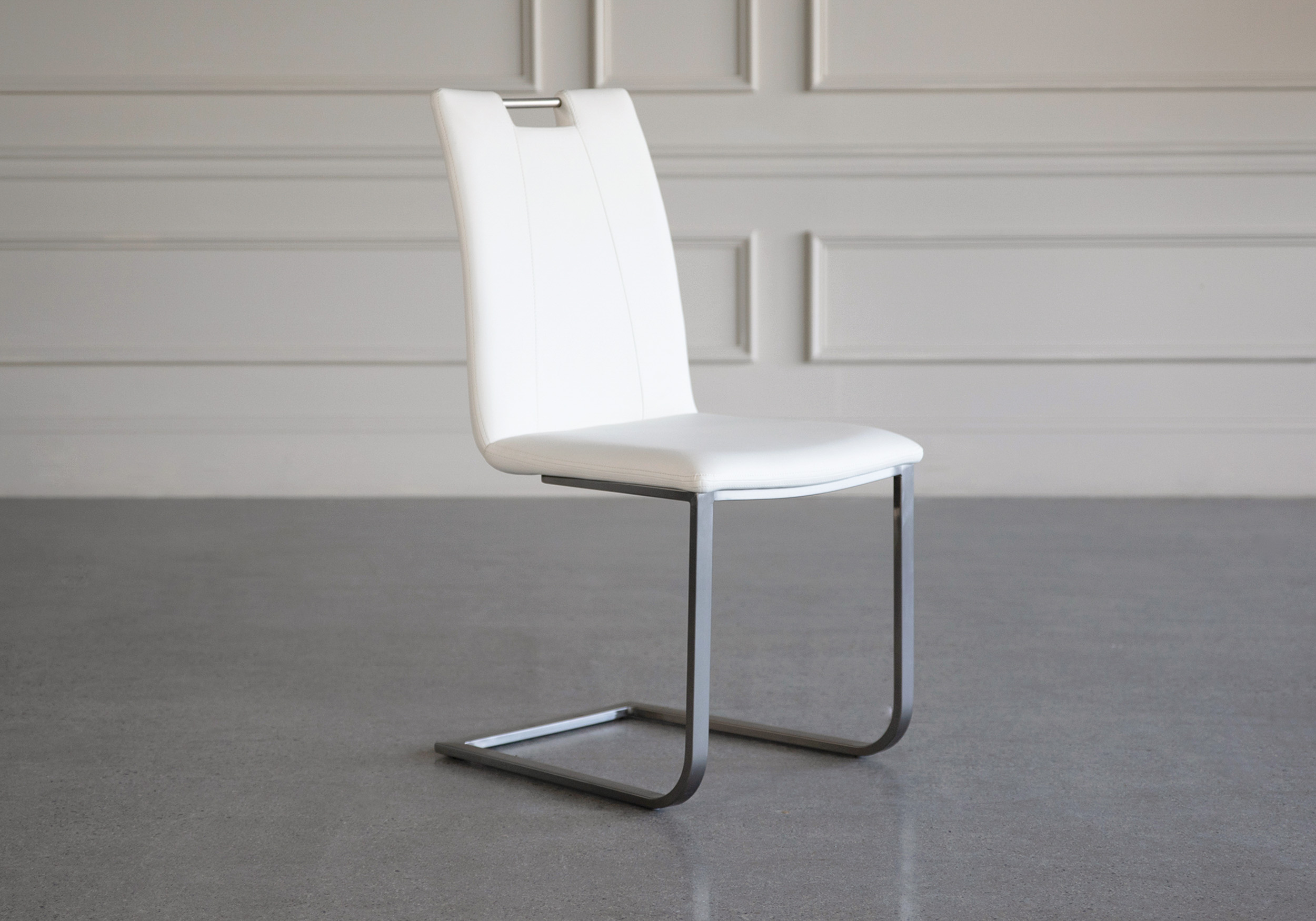 marta vinyl dining chair white angle