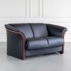 Ekornes Manhatten Loveseat in Paloma Black and Walnut, Angle