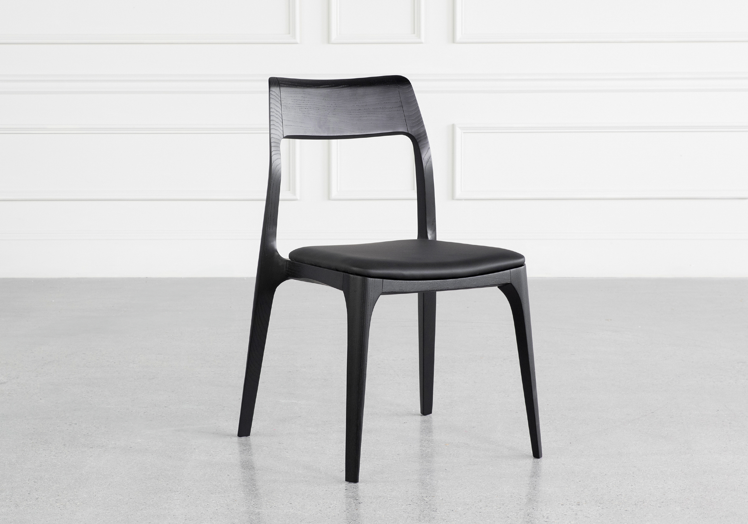 Alfred Black Vinyl Dining Chair Angle