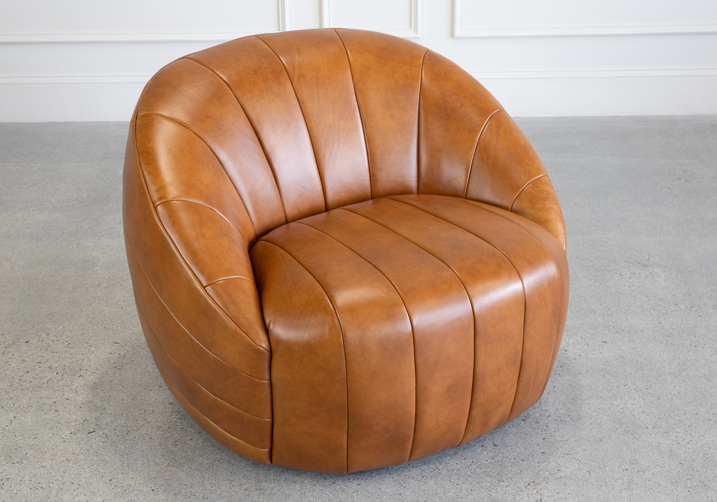 Alison Swivel Chair Tan Top Angle Alison Swivel Chair Tan Top Angle