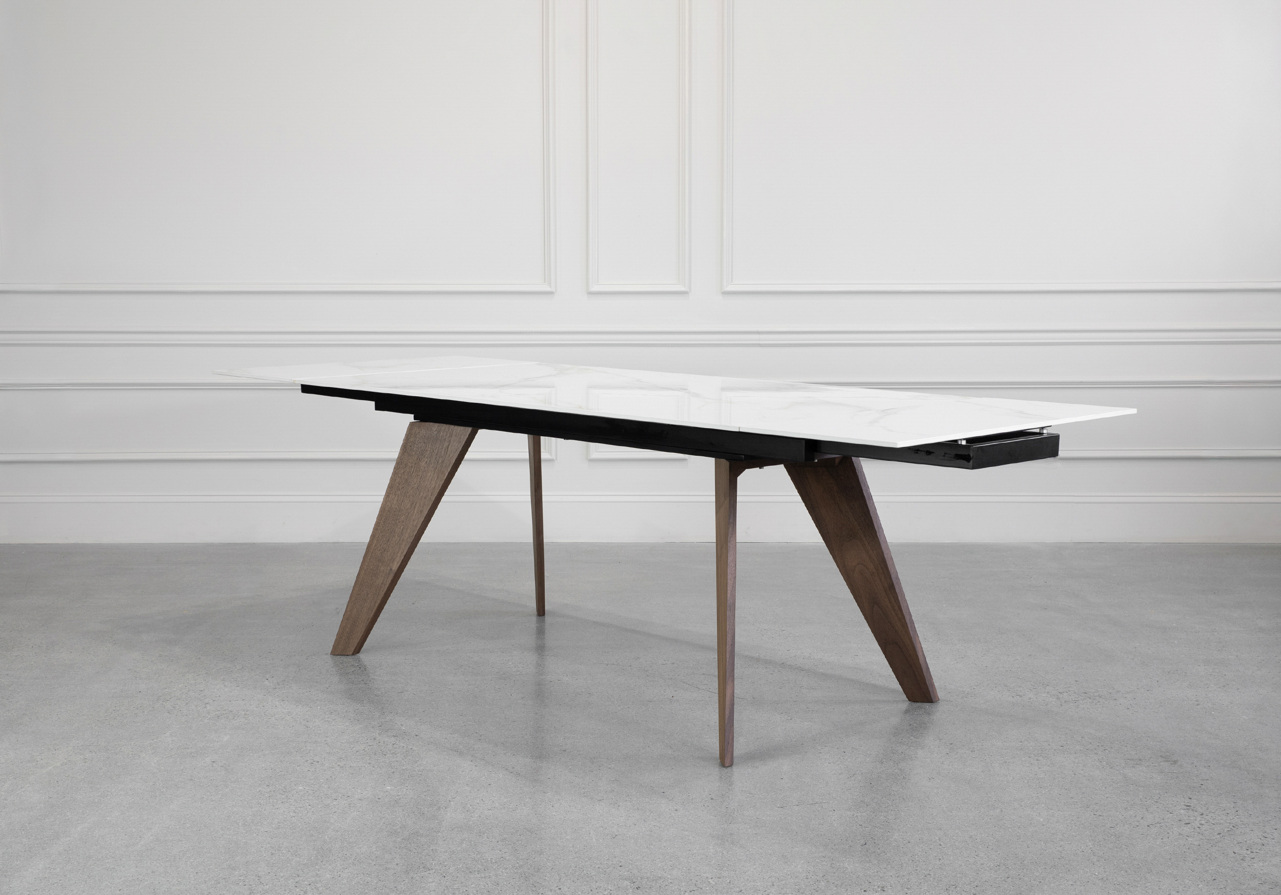 Albert White Ceramic Dining Table with Walnut Legs - Ext. Angle